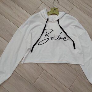 Graphic "BABE" White Long Sleeve Hooded Cropped Top.  Size M